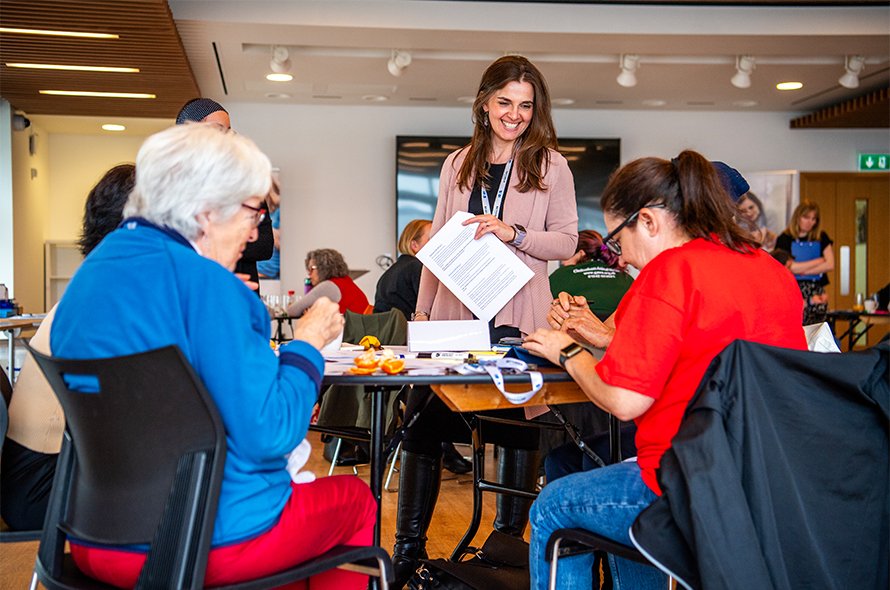 A group of people laughing and smiling
