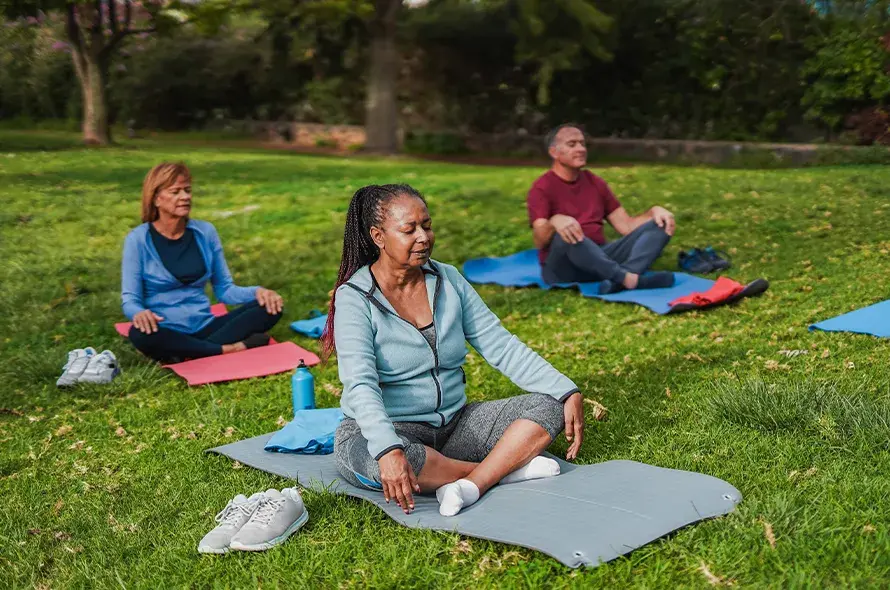 People taking part in a yoga class