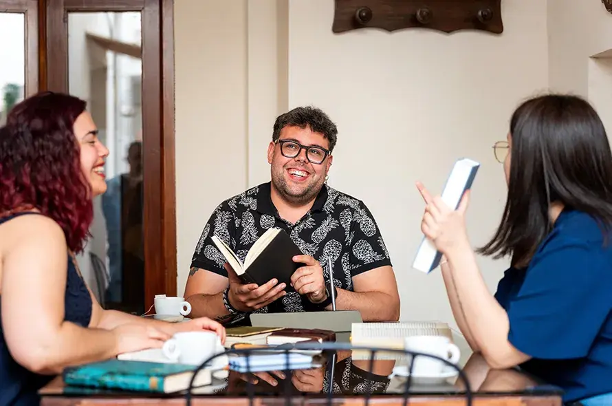People enjoying a book in a book club
